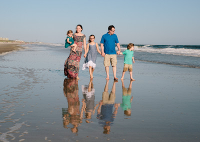 Perfect beautiful Family Portrait taken by Elizabeth Ellen Photography at Oak Island Beach